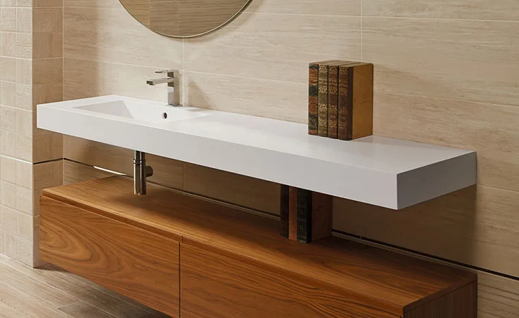 Custom solid surface sink with vanity top