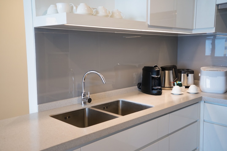 Minimalistic kitchen corner with solid surface