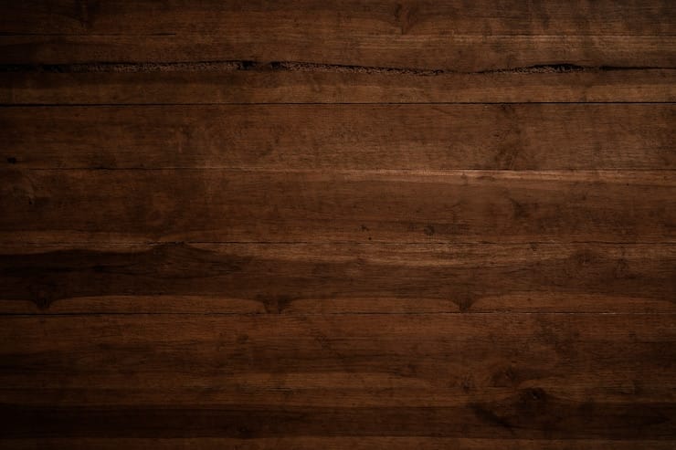 La surface de la texture du vieux bois brun