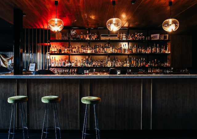 bar with a granite countertop